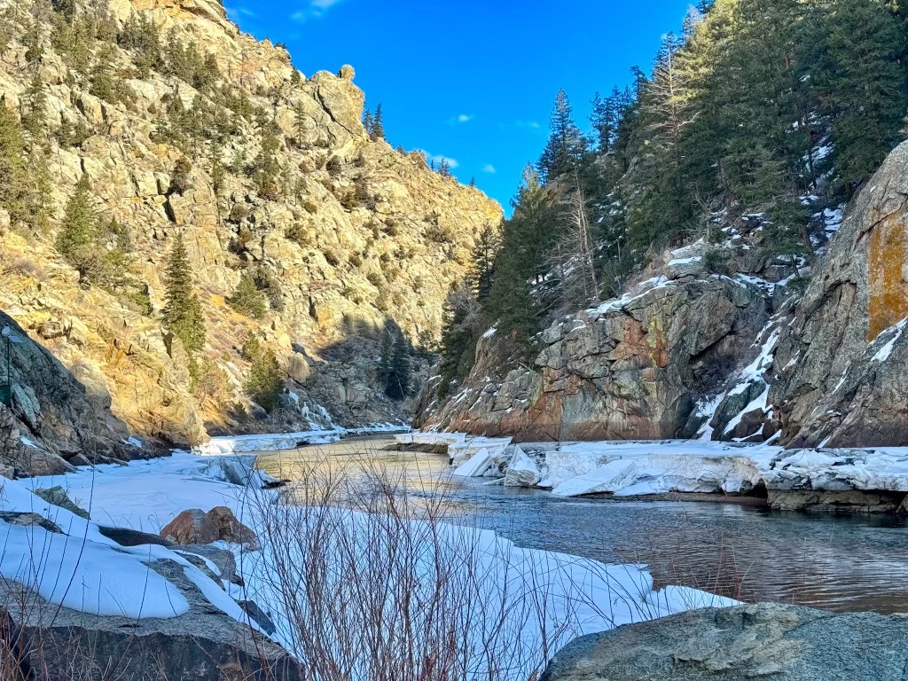 icy river in a snowy canyon