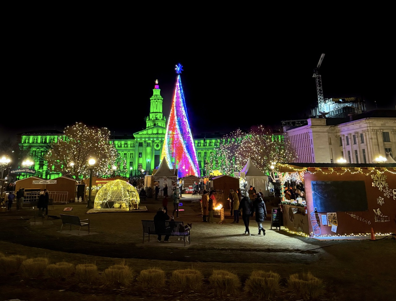 Buildings lit with colorful Christmas lights