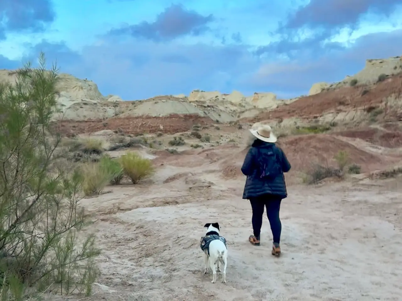 Woman walking in a desert near Kanab, Utah